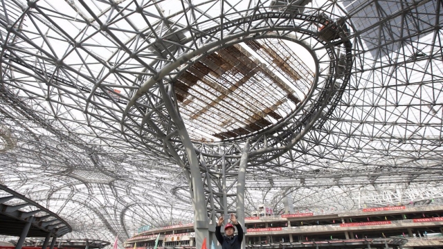 Beijing has unveiled a $12 billion airport that’s the biggest in the world — here’s the first look